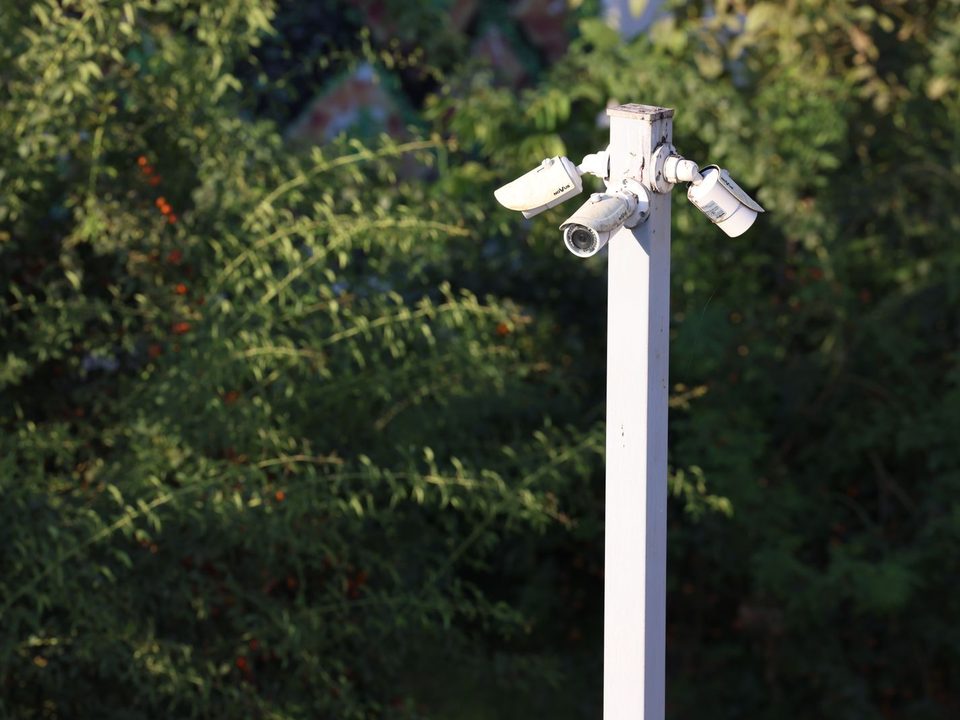 Camera pole monitoring an outdoor site